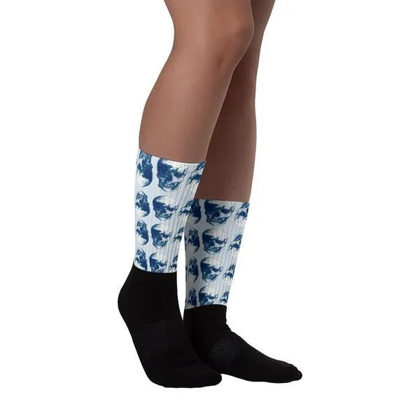 Blue Skulls Opposites Socks by Robert Bowen