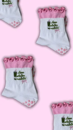 "Love Pilates So Matcha" grip sock with pink heart grips
